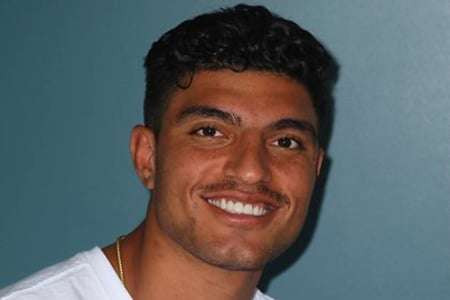 Final result showing full smile after crown restoration