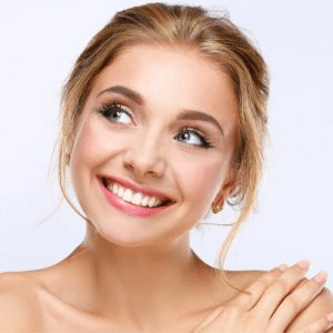 Close-up of porcelain veneers on natural teeth