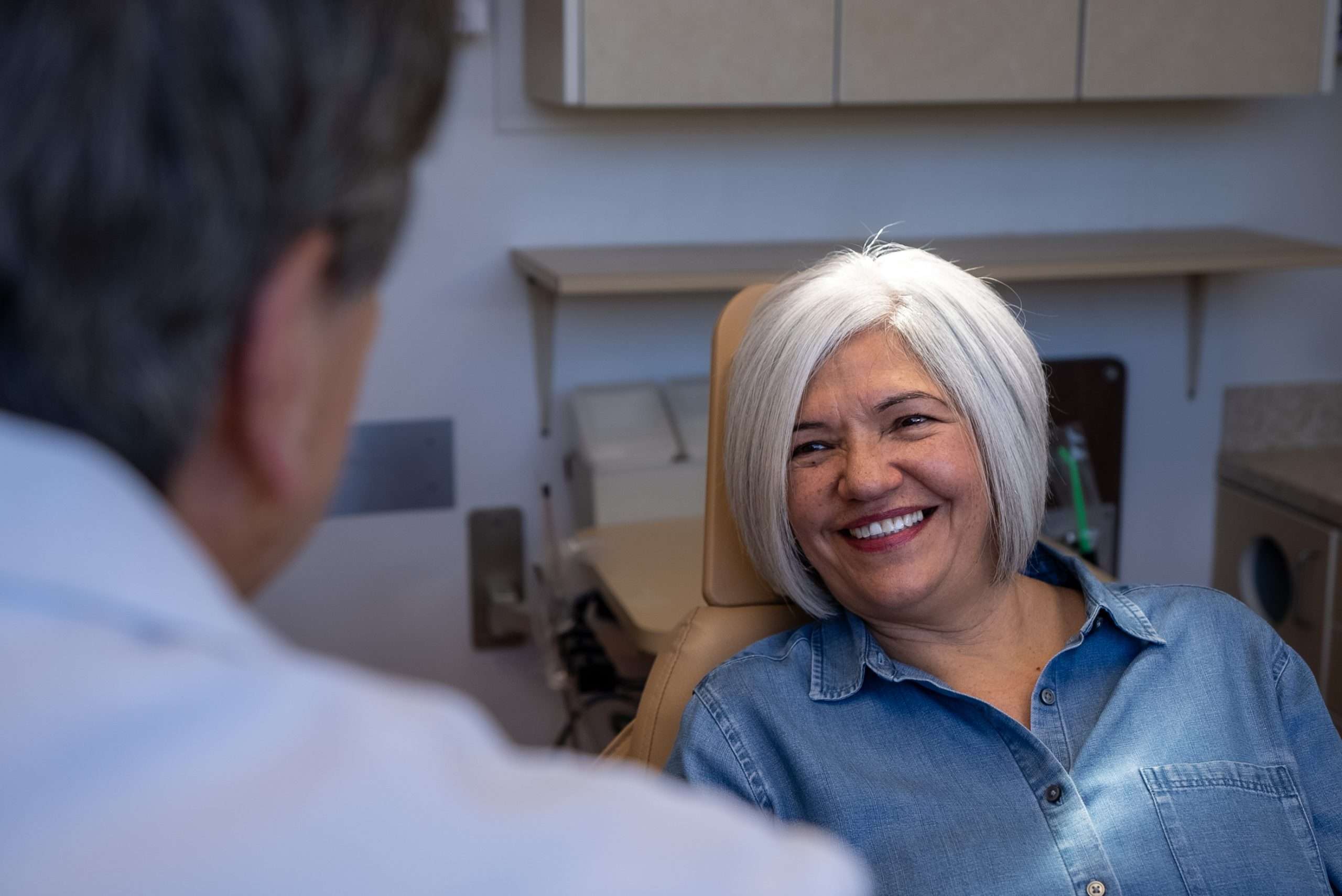 Dr. Gerald Marlin performing a dental procedure with advanced equipment