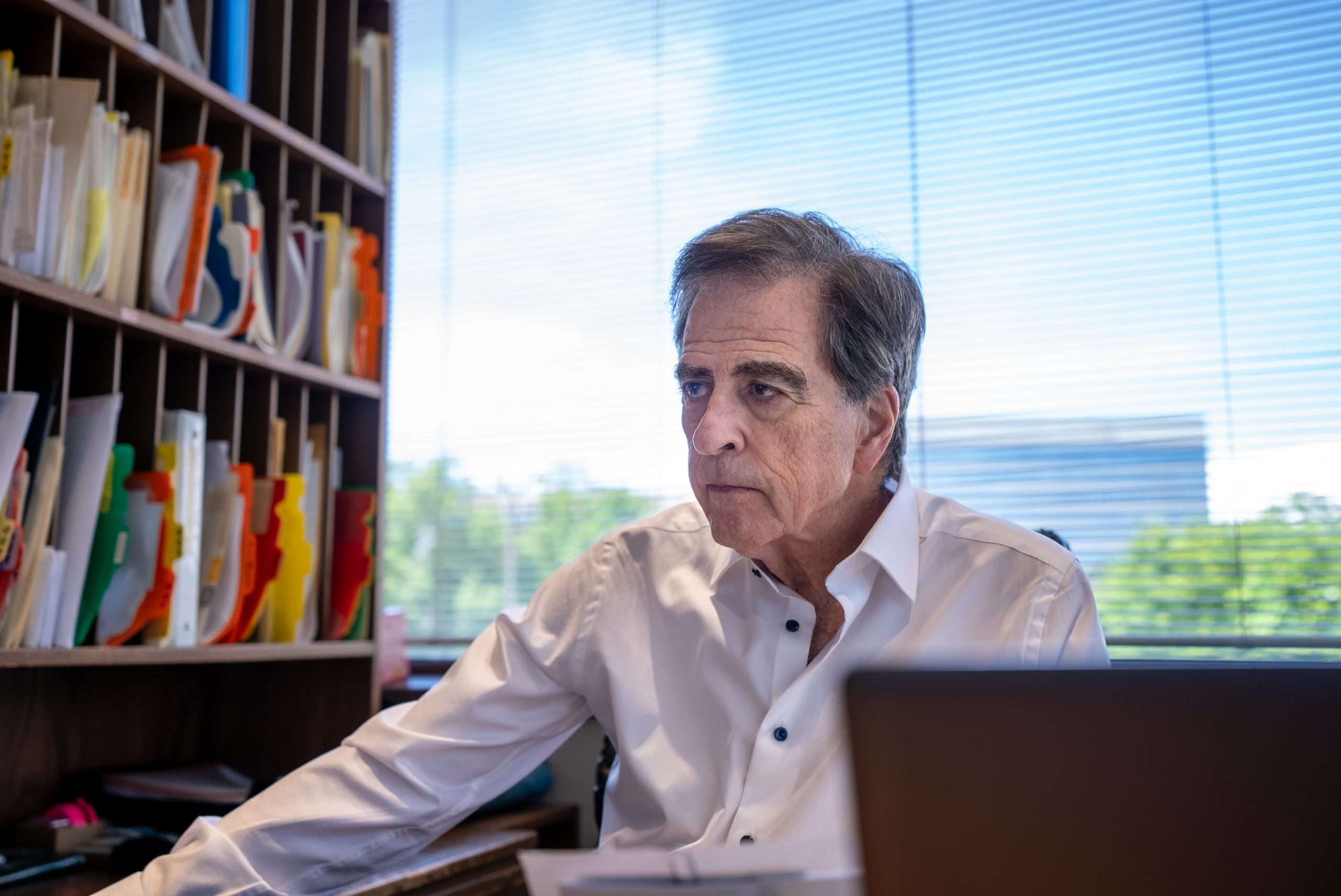 Dr. Gerald Marlin with a patient during a dental consultation