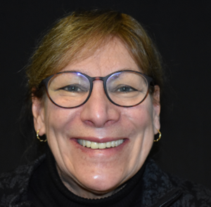 New temporary crowns pull attention away from her facial asymmetry